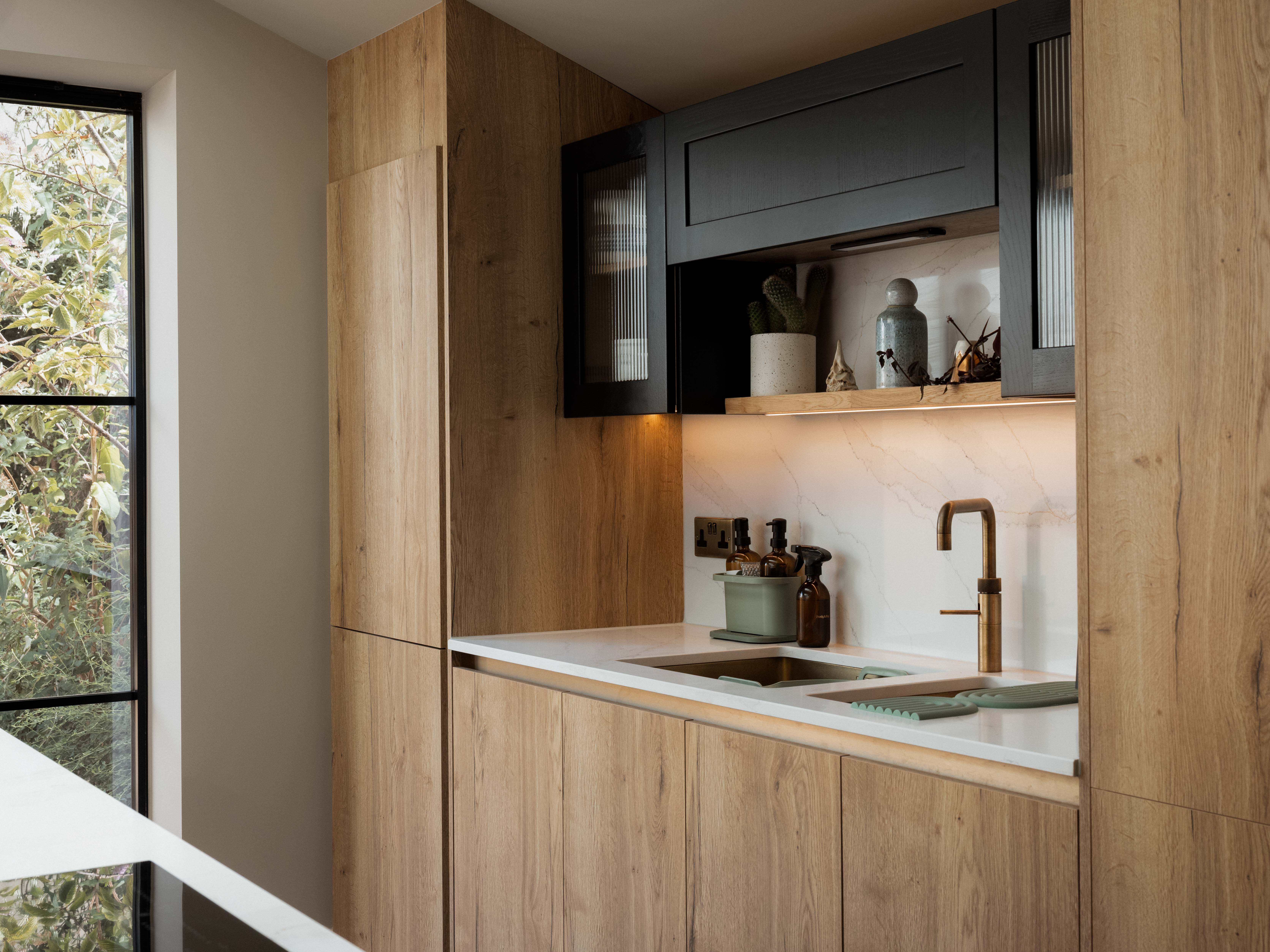Oak kitchen joinery and sink at Ewhurst Road