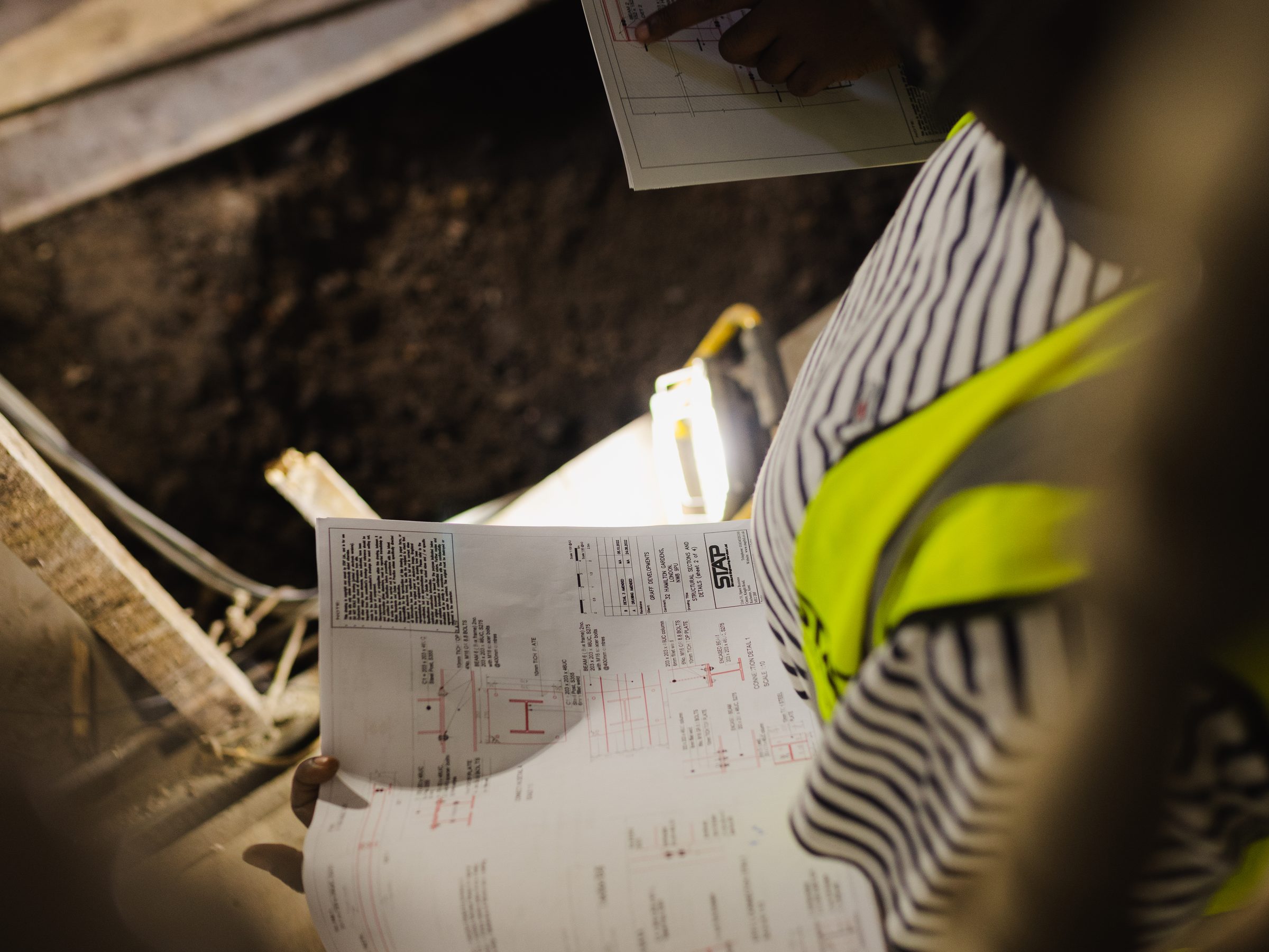 Site drawings in hand during the build