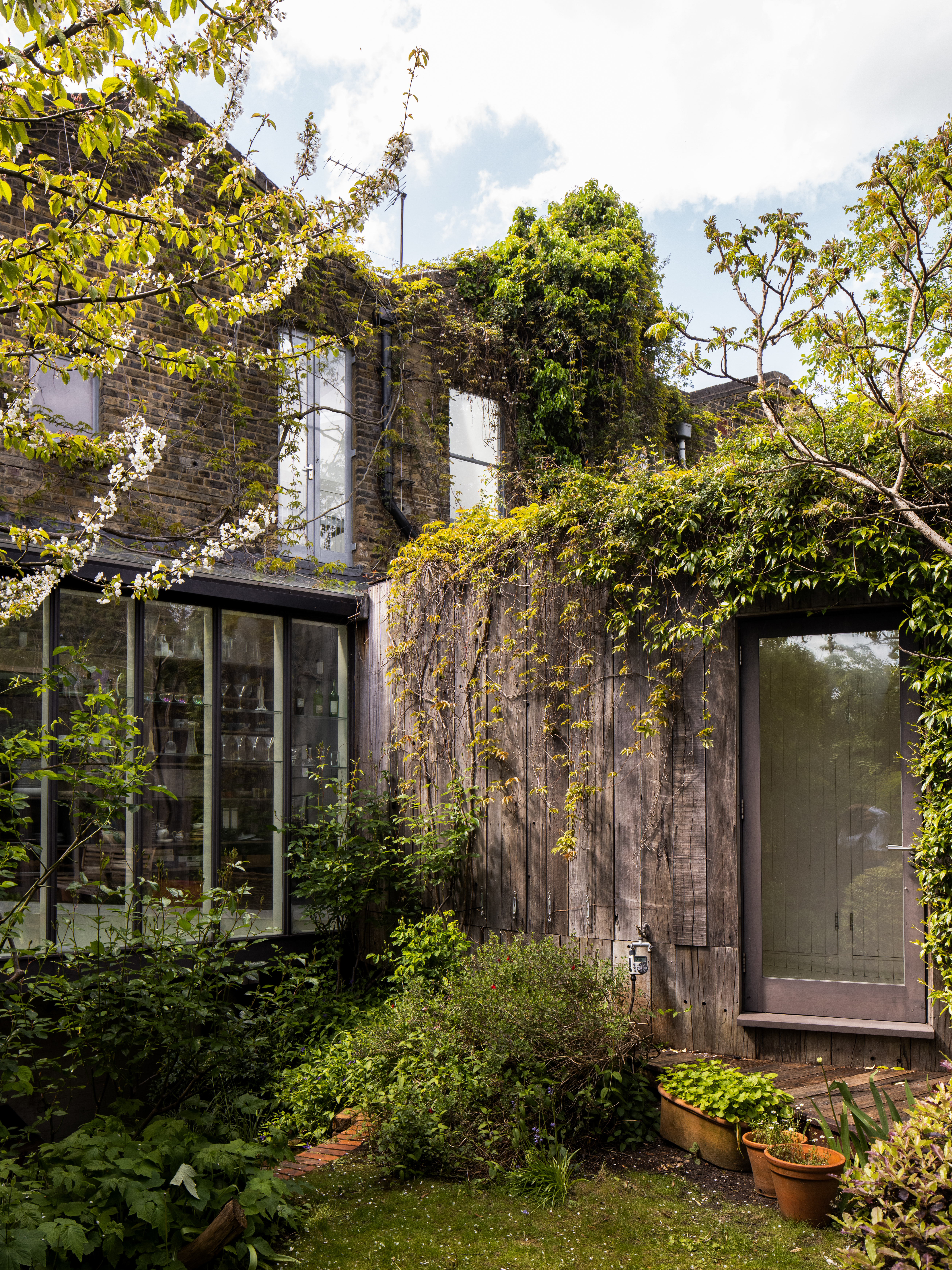 Timber-clad Treehouse exterior in the garden