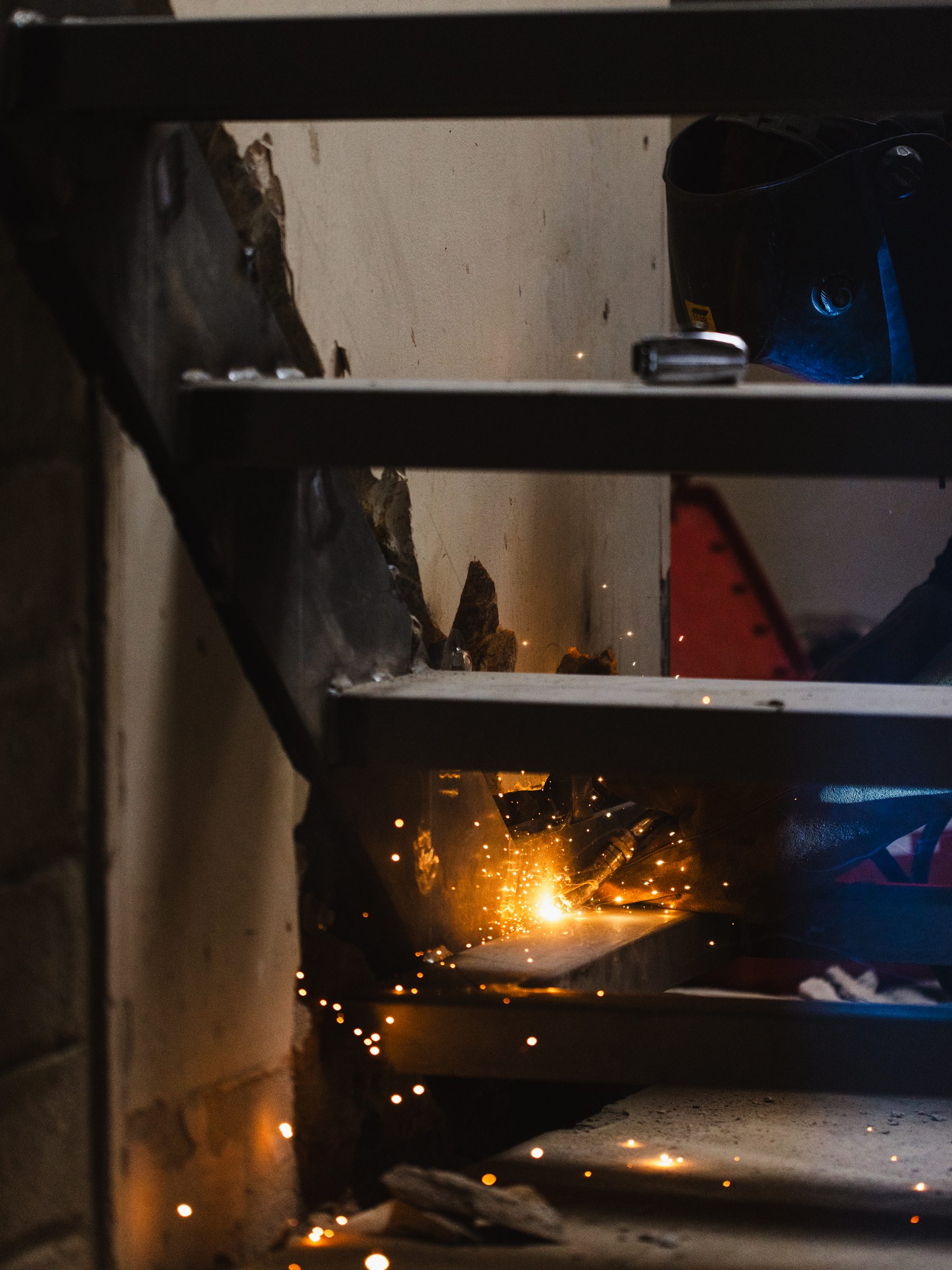 Welding sparks on the new steel staircase